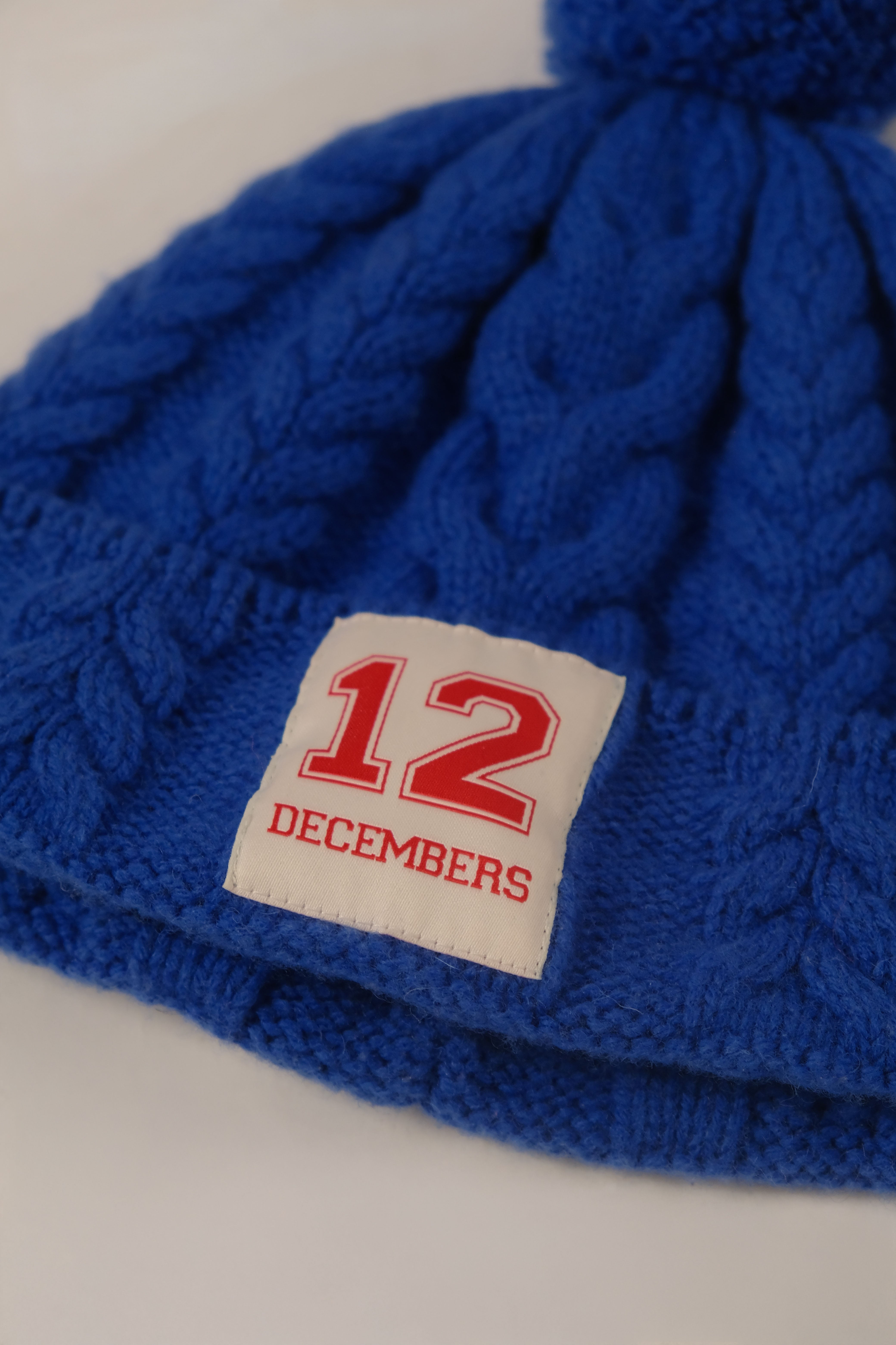12 WOOL CABLE KNIT BEANIE